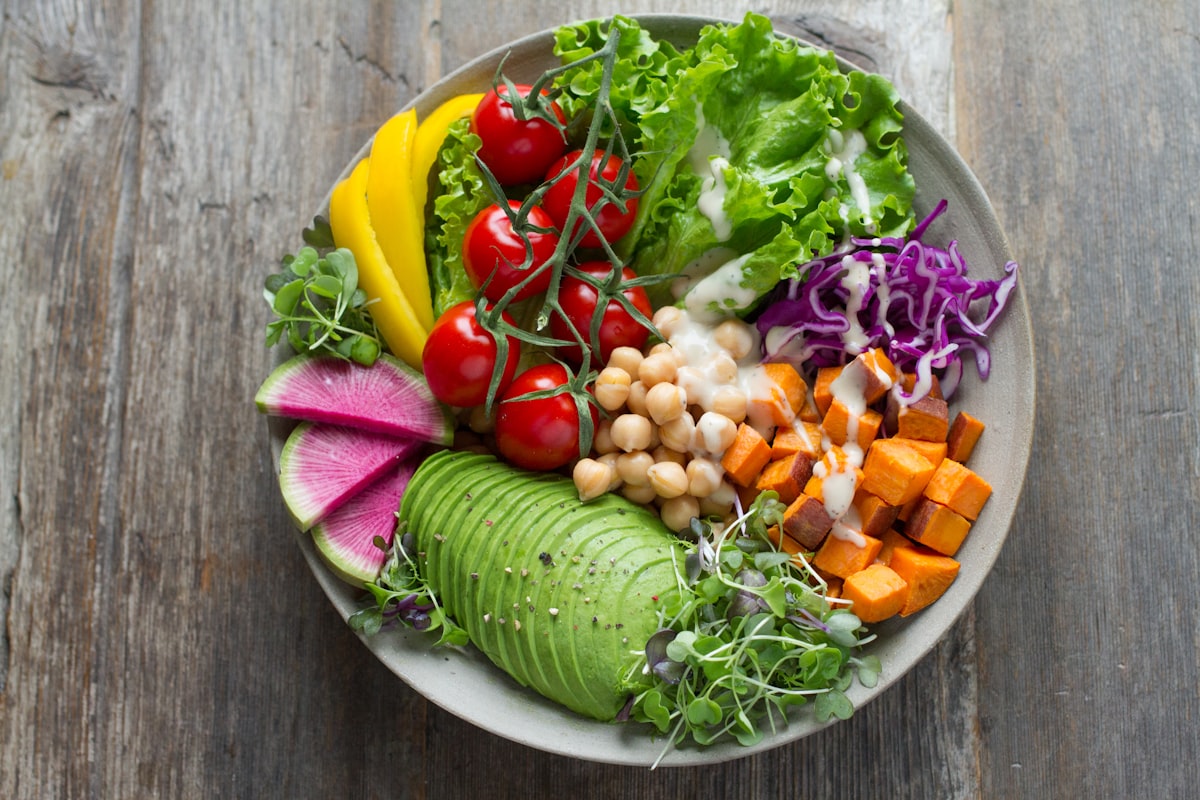 Colorful Buddha bowl with leafy greens and toppings
